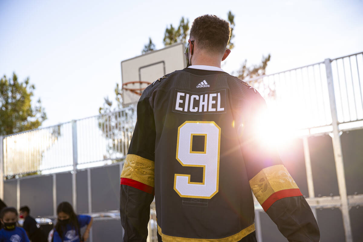 Newly acquired Golden Knights center Jack Eichel helps lead drills during a youth hockey clinic ...