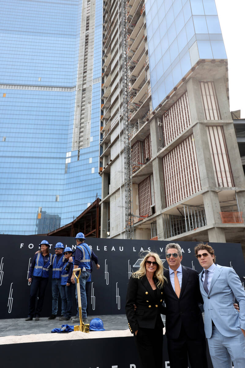 Jeffrey Soffer, chairman and CEO of Fontainebleau Development, center, with his fiancee Colleen ...