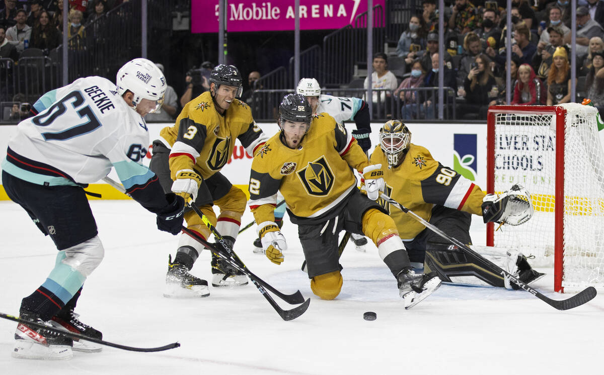 Vegas Golden Knights goaltender Robin Lehner (90) makes a save against Seattle Kraken center Mo ...