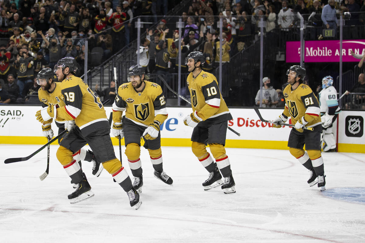 Vegas Golden Knights right wing Reilly Smith (19) celebrates with teammates after scoring again ...