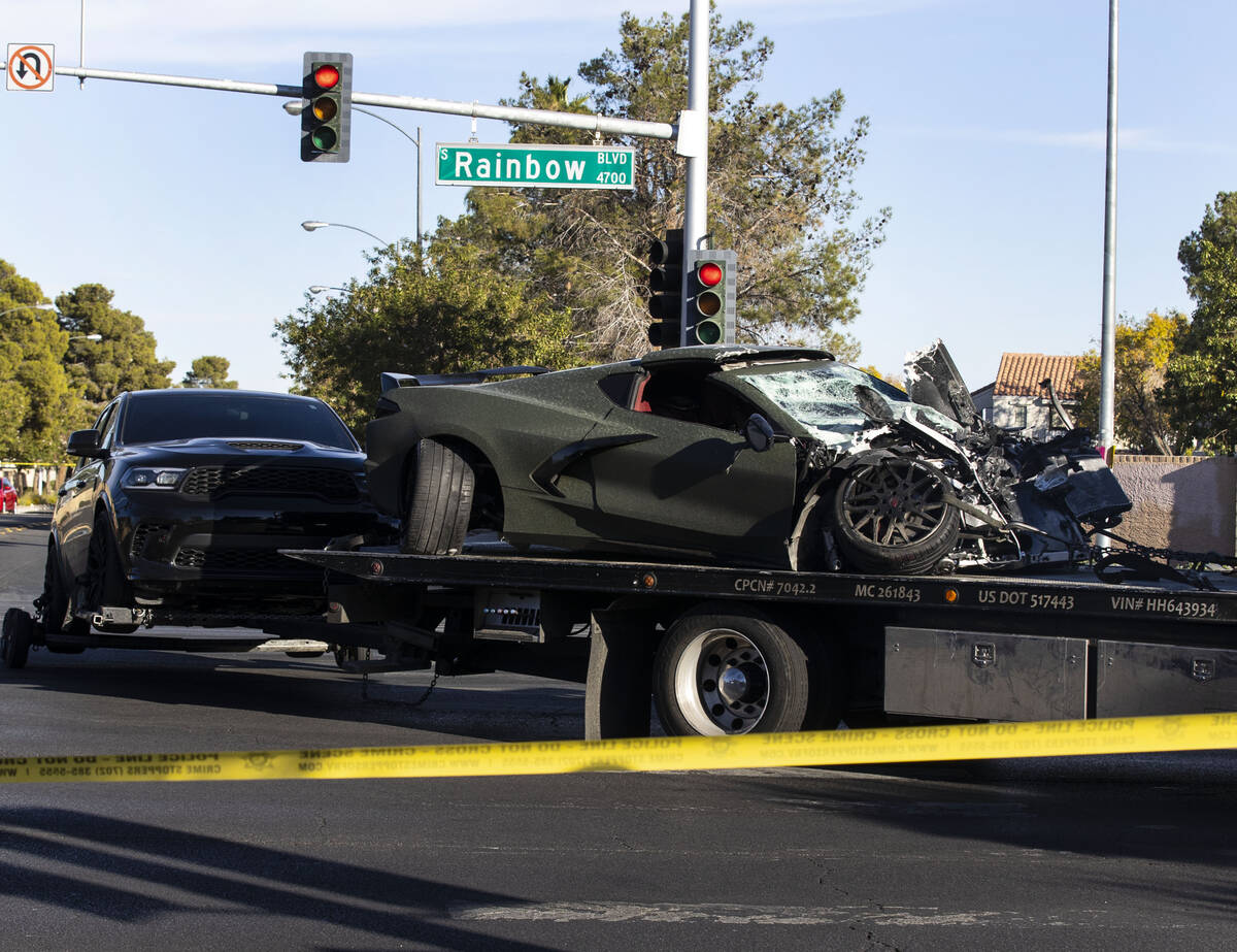 Raiders wide receiver Henry Ruggs' vehicle, front, and a Dodge Durango were towed away from the ...