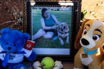 A photograph of Tina Tintor, 23, and her dog Max at a makeshift memorial site to honor them at ...