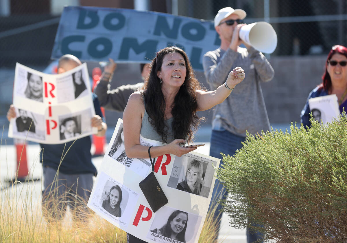 Protester Lorena Cardenas tries to convince a mother not to vaccinate her children at Southern ...