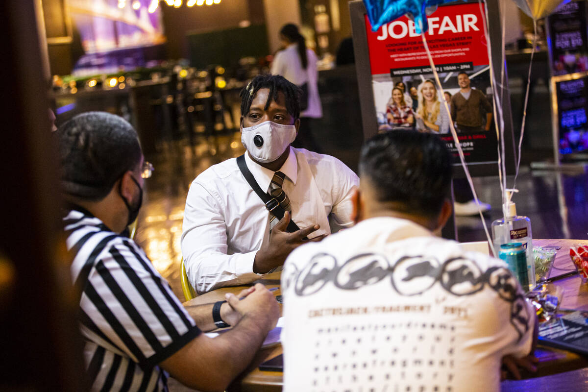 Paris Star, who recently moved to Las Vegas, interviews with Luis Infante, store manager at Foo ...
