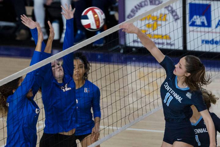 Centennial's Grace Dietrich (11) kills the ball against Bishop Gorman during the class 4A state ...