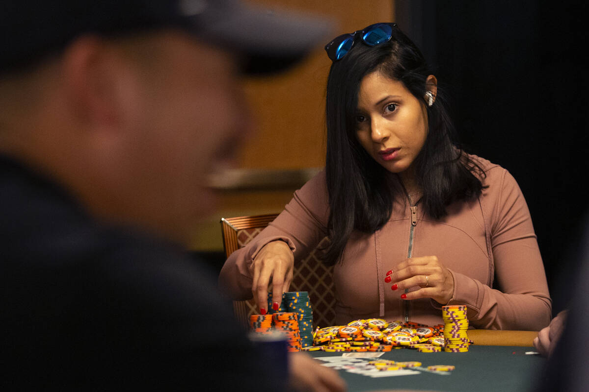 Chip leader Jessica Cai eyes her opponent during the World Series of Poker Main Event at the Ri ...