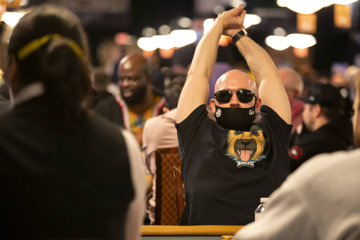 Joe Marincola stretches out while in a game during the World Series of Poker Main Event at the ...