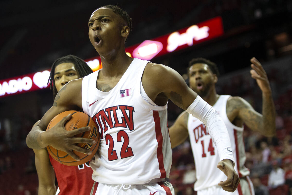 UNLV Rebels guard Josh Baker (22) and forward Royce Hamm Jr. (14) react to a refereeճ cal ...