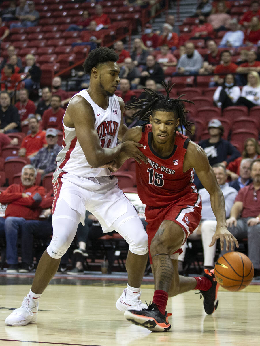 UNLV Rebels guard Bryce Hamilton (13) guards Gardner Webb Runnin Bulldogs forward Zion Williams ...