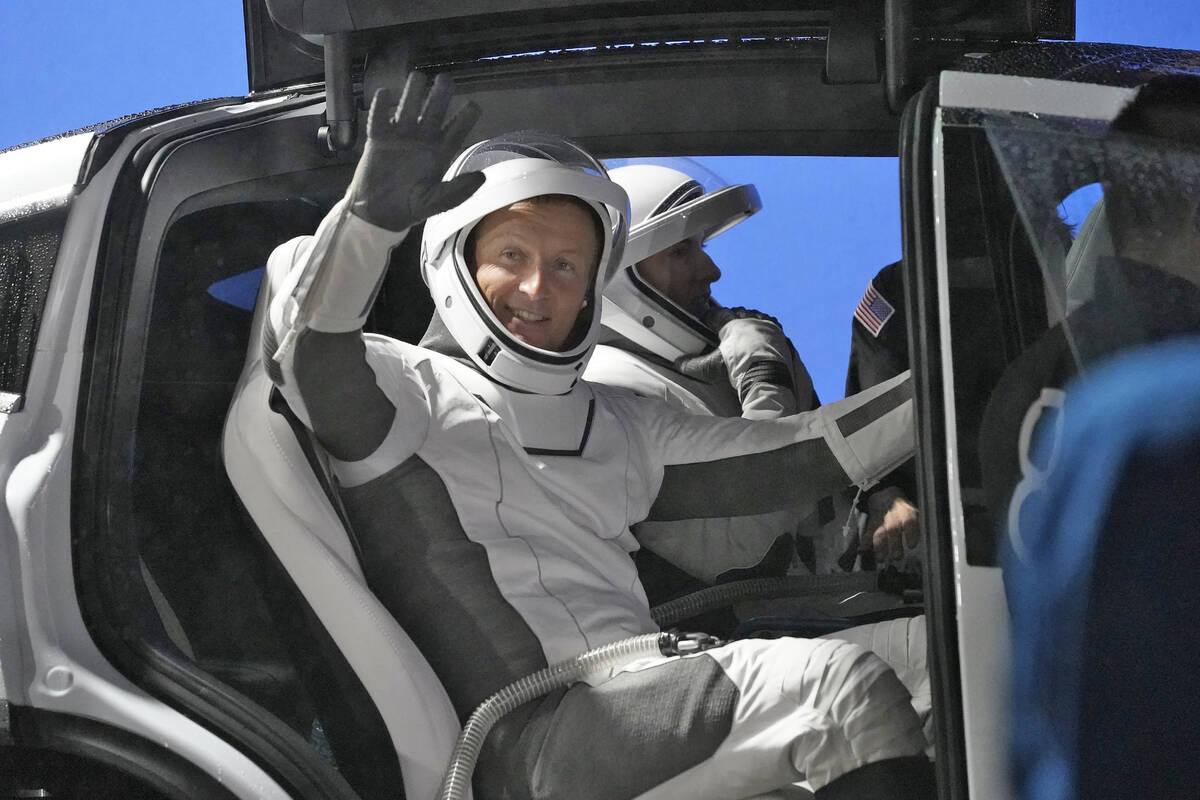 Astronaut Matthias Maurer, of Germany, waves as he gets into a car before a trip to Launch Pad- ...