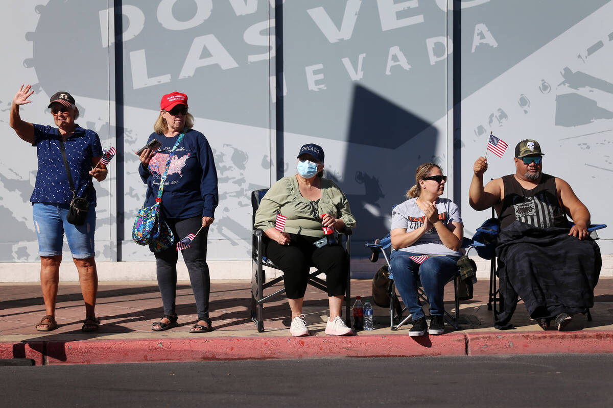 People watch the Veterans Day parade on 4th Street in downtown Las Vegas, Thursday, Nov. 11, 20 ...