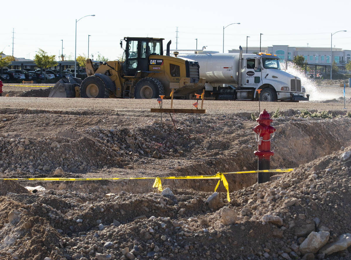 Heavy construction equipments are seen at a construction site where Narrative, a four-story off ...