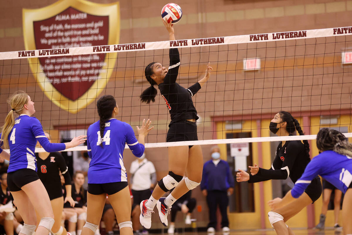 Liberty's Romona Pulu (14) hits the ball against Sierra Vista during the Class 4A state girl's ...