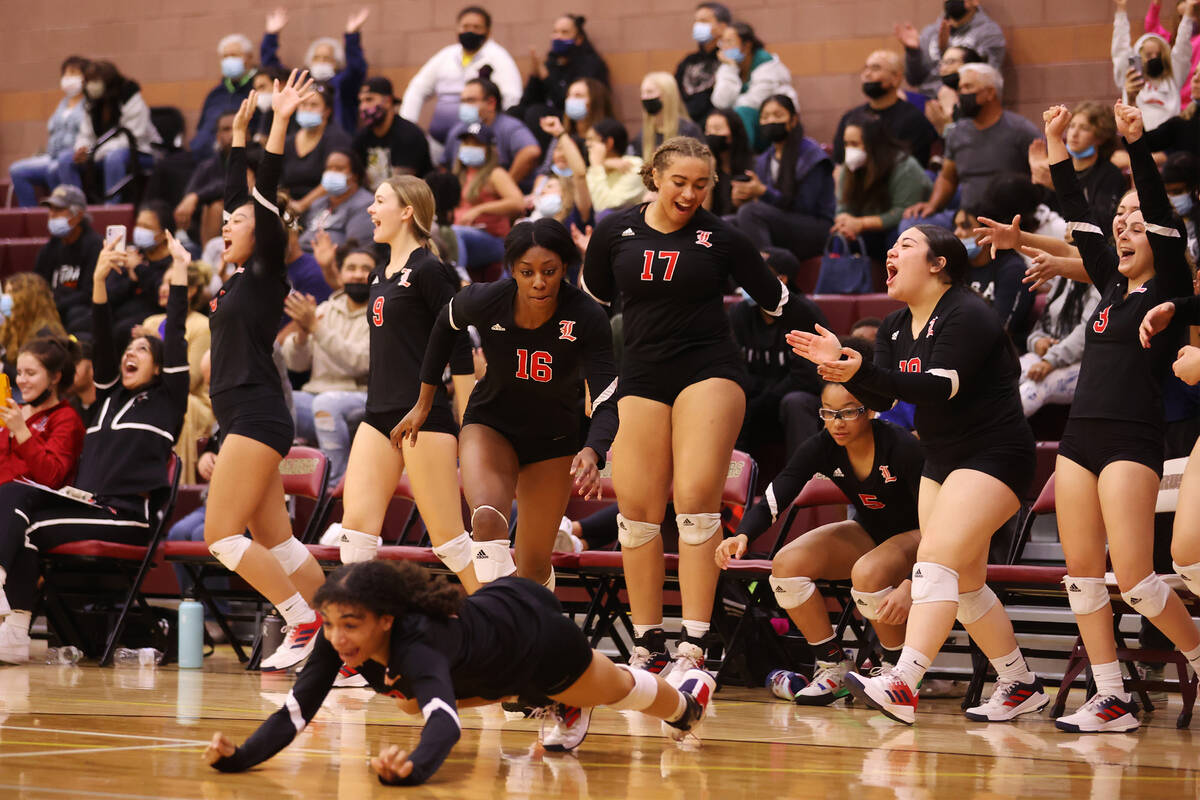 Liberty players celebrates their win against Sierra Vista during the Class 4A state girl's voll ...