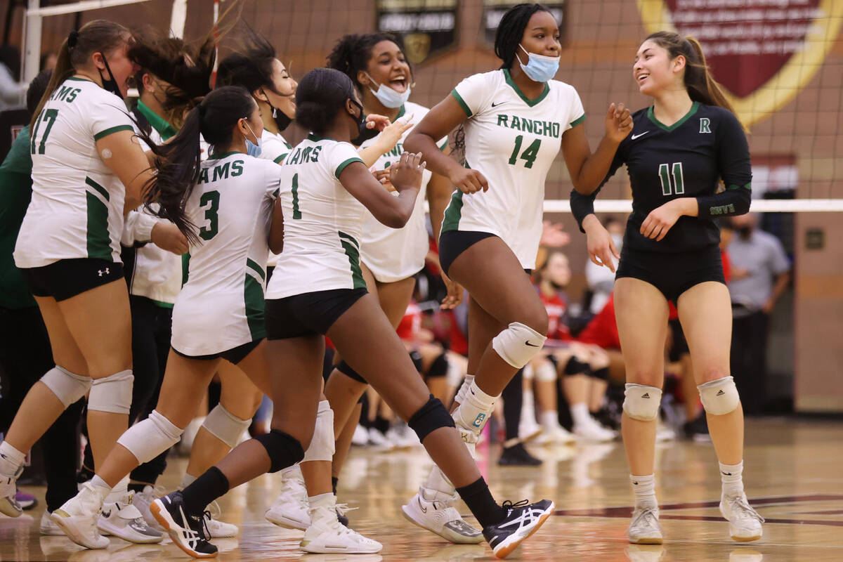 Rancho's Italya Cloyd (14) celebrates her game winning point with her team during the Class 4A ...