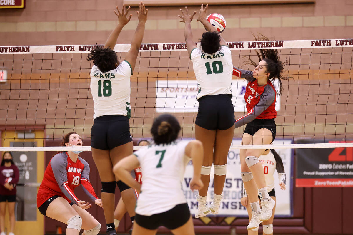 Rancho's Leah Miller (10) with teammate D'Ahjanae Hayes (18), blocks a shot by Arbor View's Tat ...
