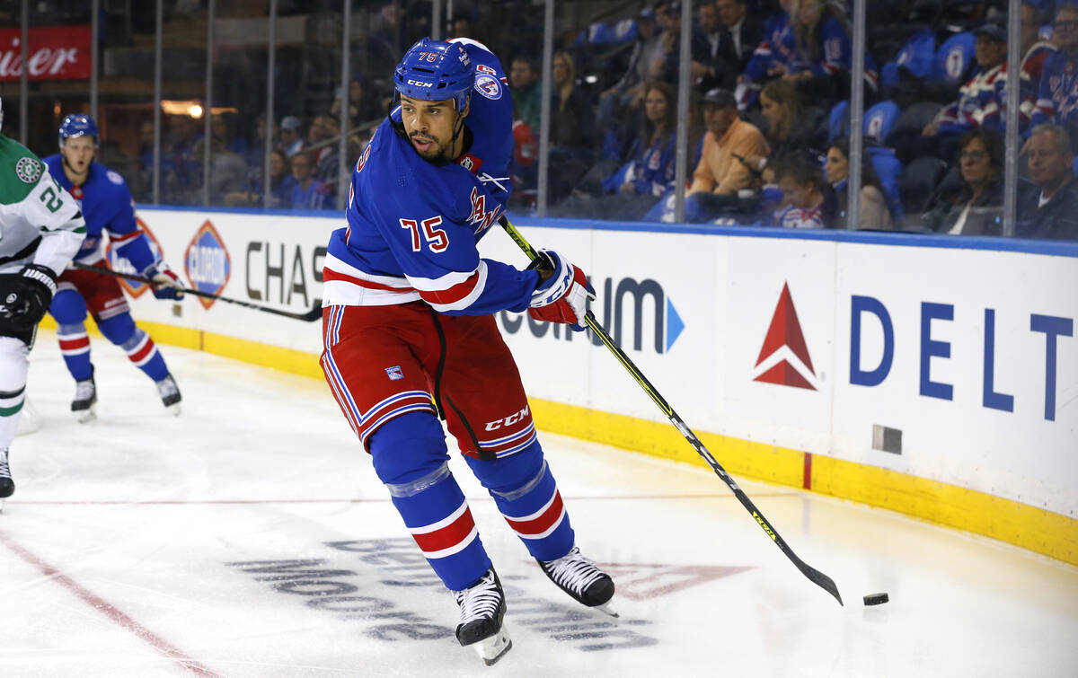 New York Rangers right wing Ryan Reaves (75) plays the puck against the Dallas Stars during the ...