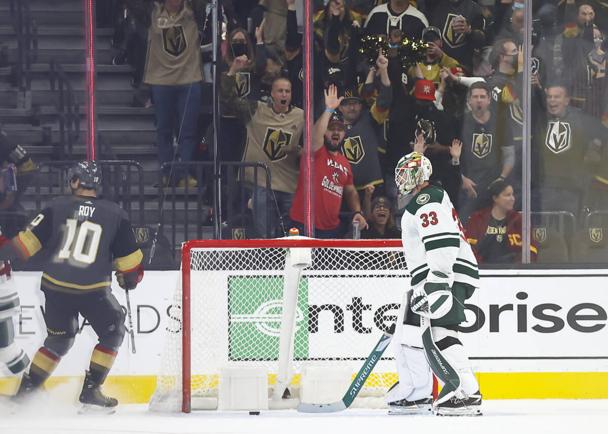 Golden Knights fans cheer after a goal by Golden Knights center Jonathan Marchessault, not pict ...