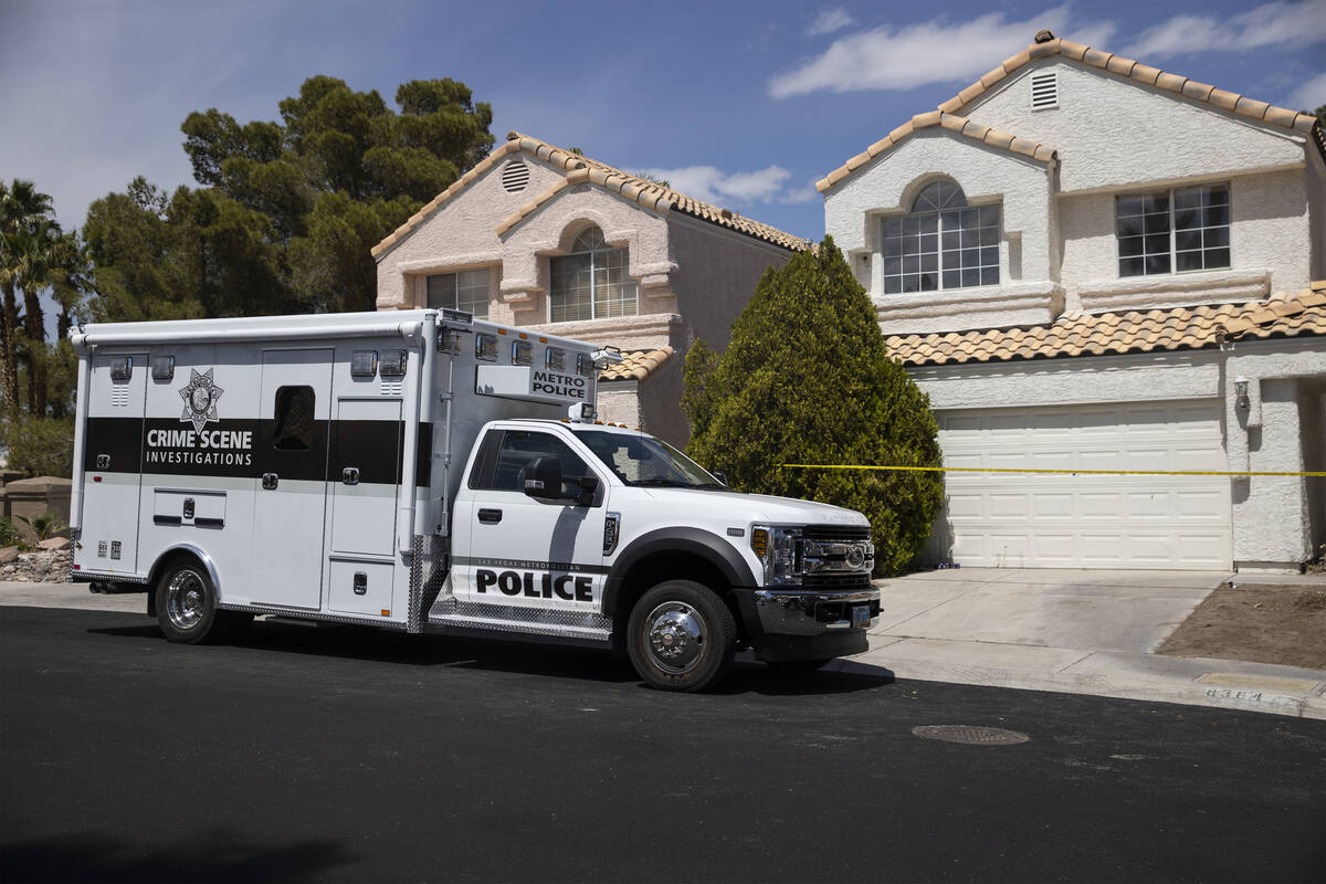 The Las Vegas Metropolitan Police Department investigate the discovery of human remains at a ho ...