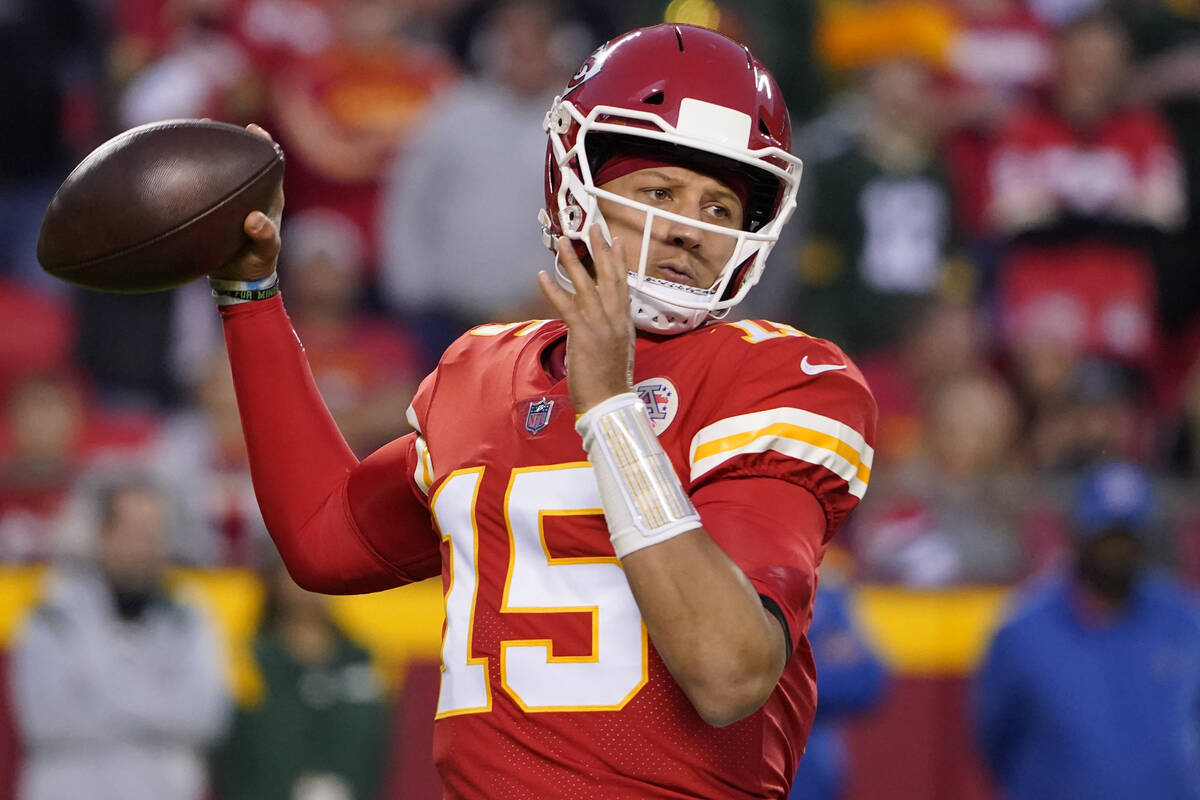 Kansas City Chiefs quarterback Patrick Mahomes throws during the second half of an NFL football ...