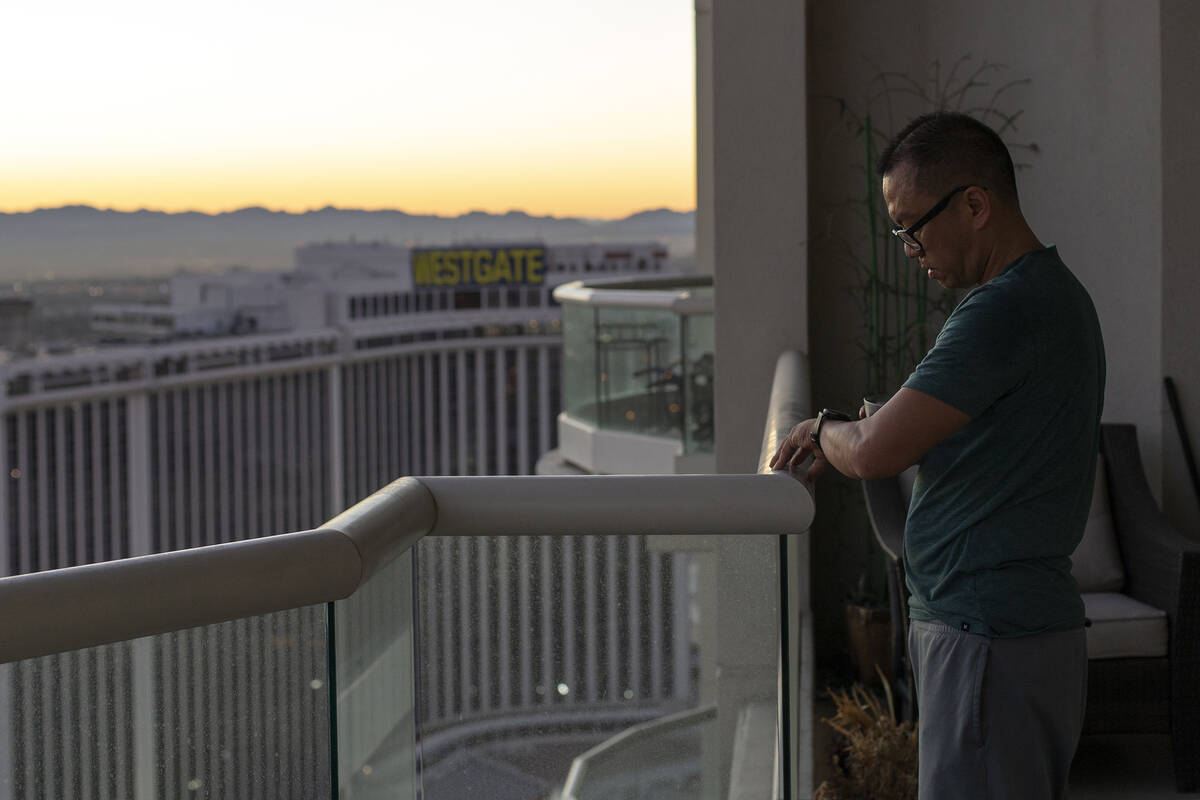 Khanh Nguyen, who had a severe case of COVID-19 and was on a ventilator for about 6 weeks, chec ...
