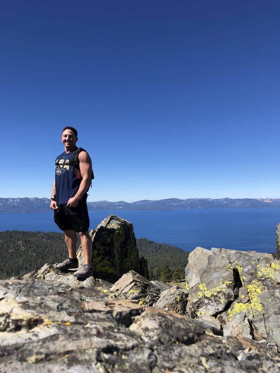Matt Breslow takes a break during a run on the Tahoe Rim Trail at Lake Tahoe in 2019. On the or ...