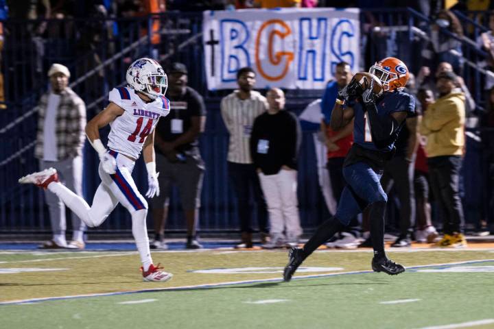 Bishop Gorman’s wide receiver Zachariah Branch (1) catches a touchdown pass as Liberty ...