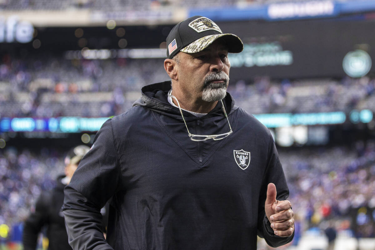 Las Vegas Raiders interim head coach Rich Bisaccia runs off the field after losing to the New Y ...