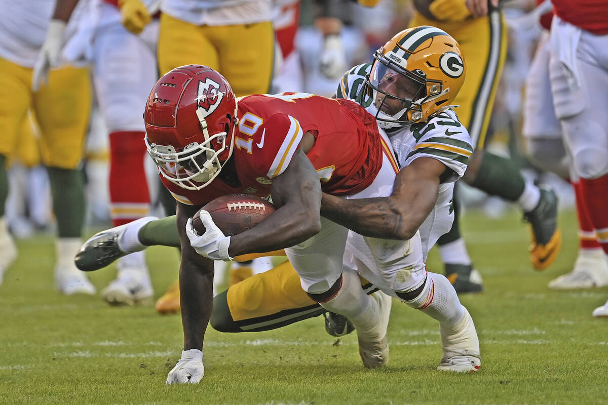Green Bay Packers cornerback Rasul Douglas (29) tackles Kansas City Chiefs wide receiver Tyreek ...