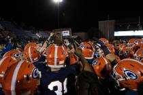 Bishop Gorman players celebrate after beating Liberty High during a Class 5A state semifinal fo ...