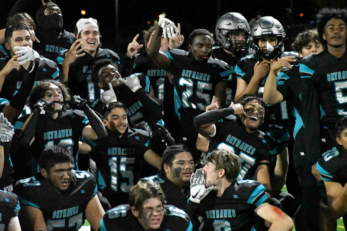 The Silverado football team celebrates a 42-7 win over Coronado in the 4A state semifinals on F ...