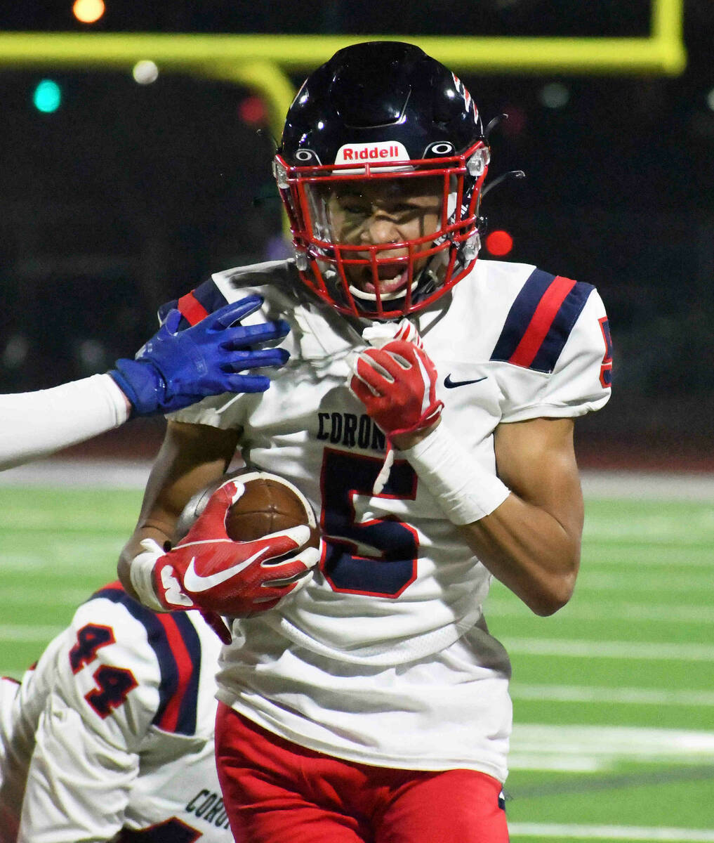 Coronado’s Brandon Palmer celebrates an interception during the first half of a 4A state ...