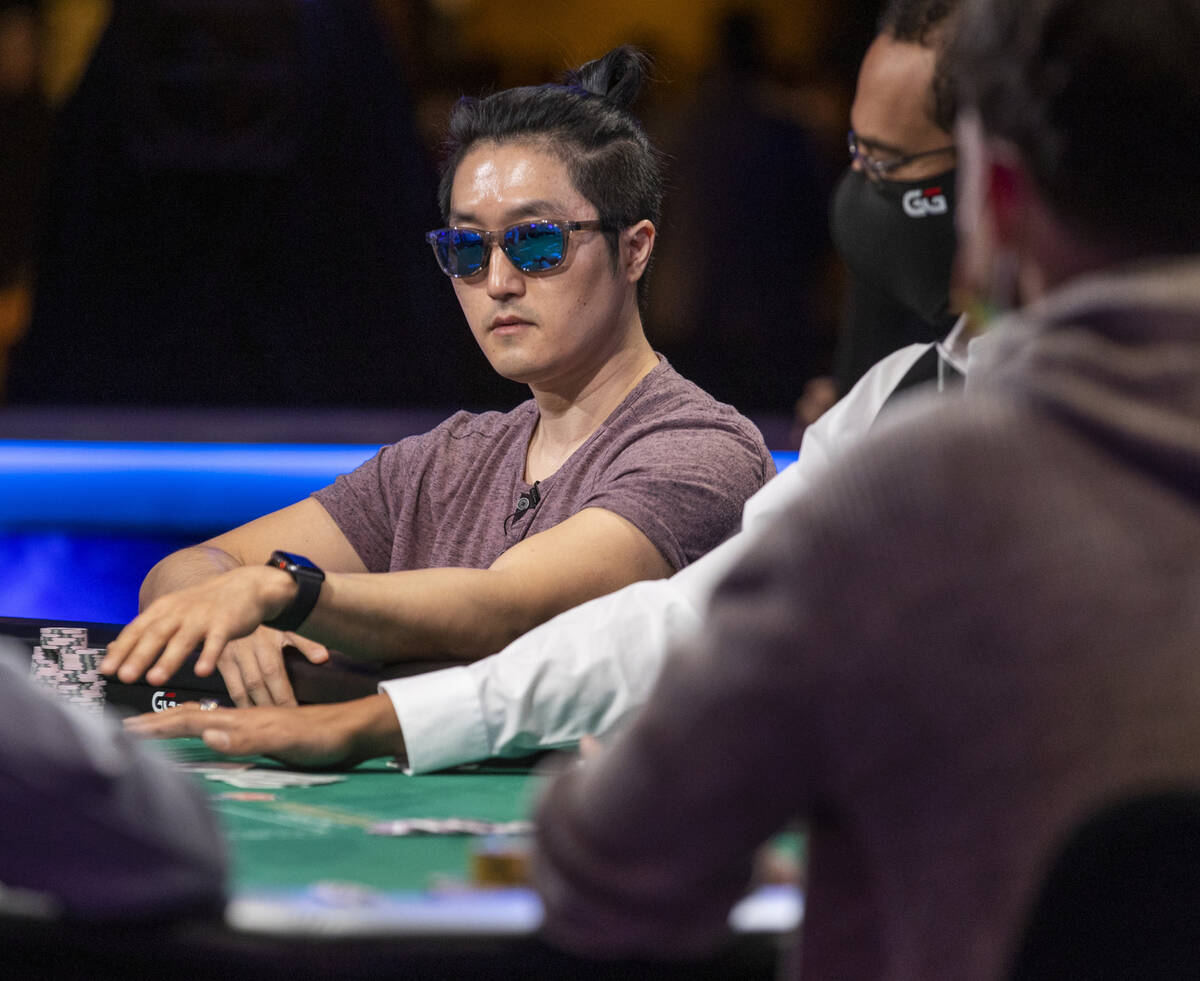 Hye Park tosses in some chips at the final table for the $10,000 buy-in Main Event at the World ...