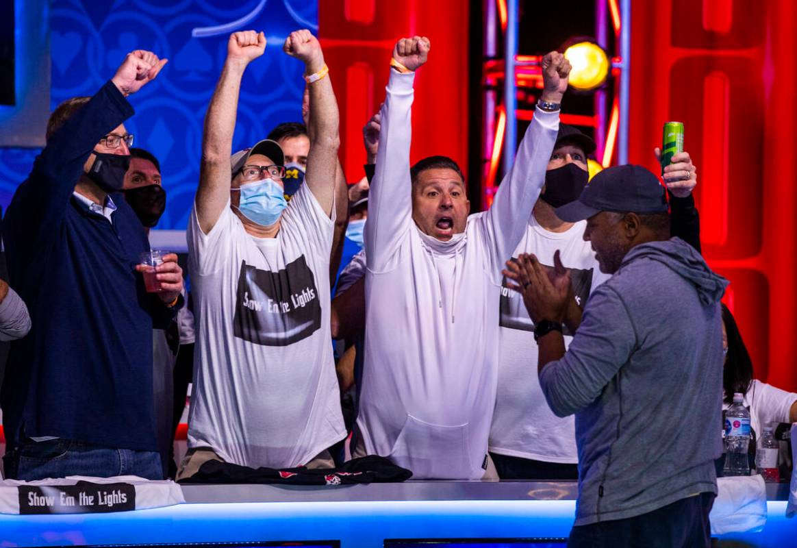 The gallery cheers as George Holmes eliminates Jack Oliver with just two players remaining at t ...
