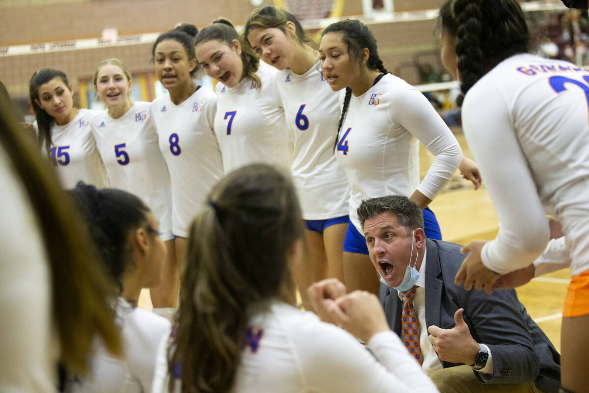 Bishop Gorman head coach Gregg Nunley pumps up the team in a timeout during the Class 5A state ...