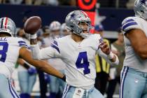 Dallas Cowboys quarterback Dak Prescott (4) looks to pass against the Denver Broncos during an ...