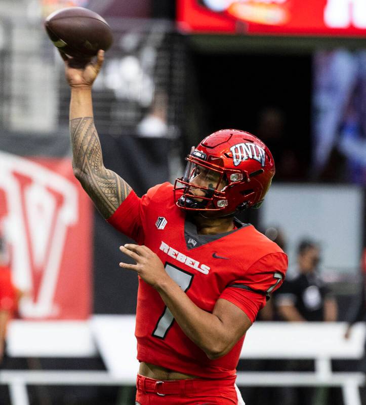 UNLV Rebels quarterback Cameron Friel (7) throws the ball as he warms up before an NCAA footbal ...