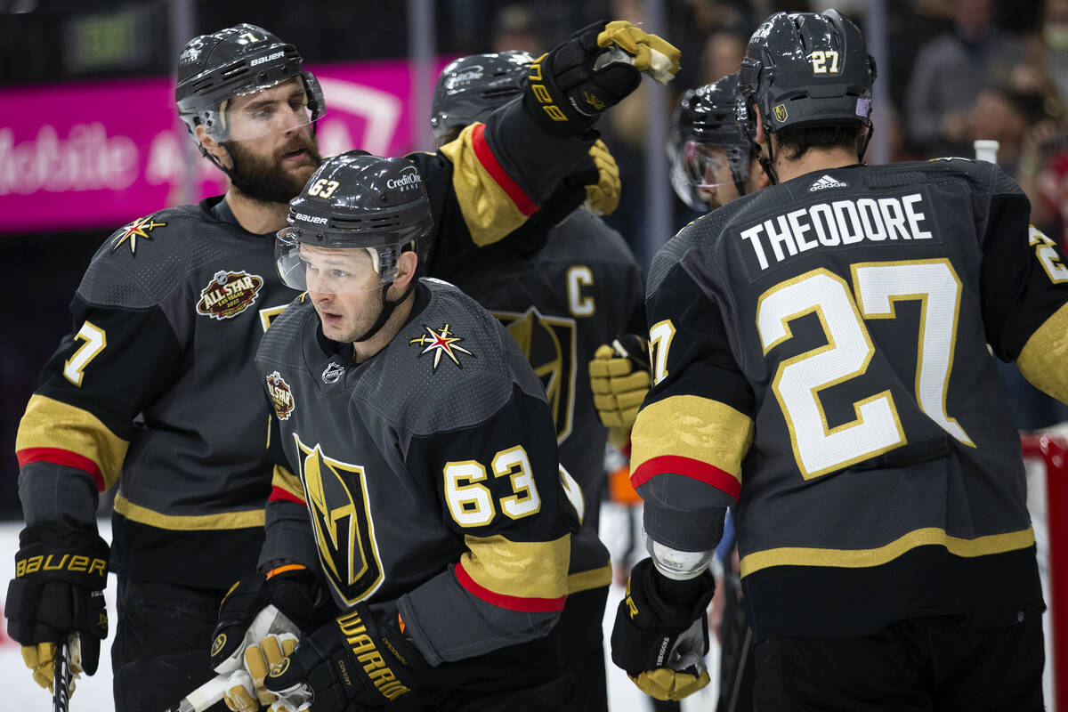 Golden Knights right wing Evgenii Dadonov (63) leaves the huddle after scoring a goal during th ...