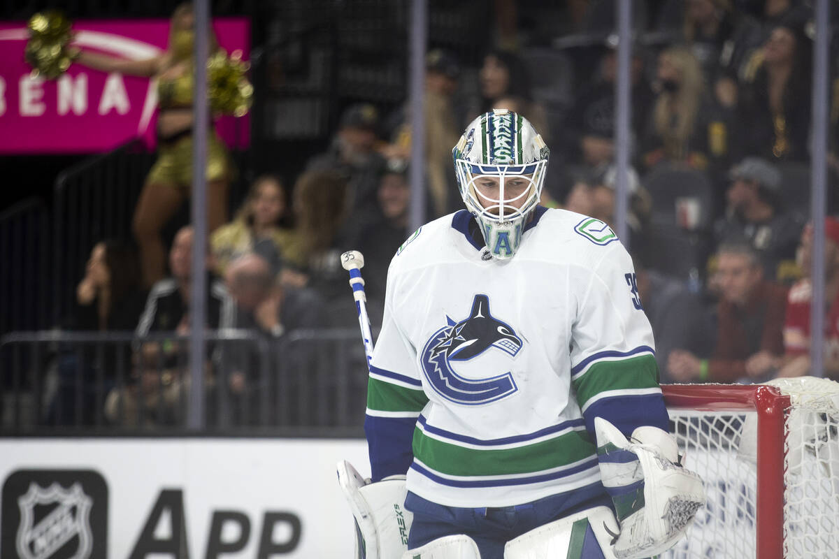 Canucks goaltender Thatcher Demko (35) minds the goal after the Golden Knights scored during th ...