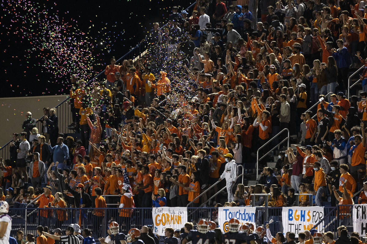 Bishop Gorman fans celebrate after their team won against Liberty High during a Class 5A state ...