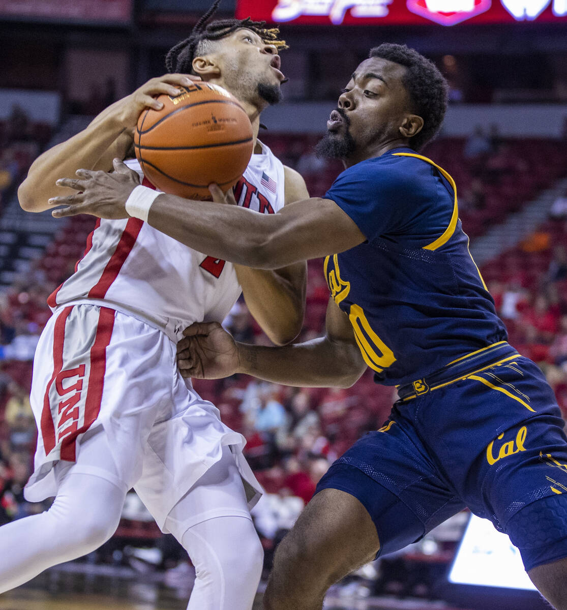 UNLV Rebels guard Justin Webster (2) drives hard to the basket against California Golden Bears ...
