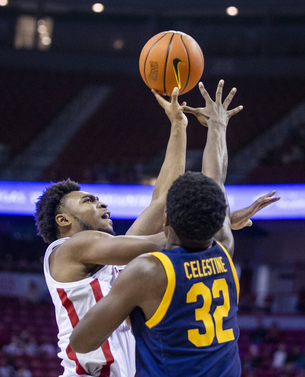 UNLV Rebels guard Bryce Hamilton (13) elevates for a shot over California Golden Bears guard Ja ...