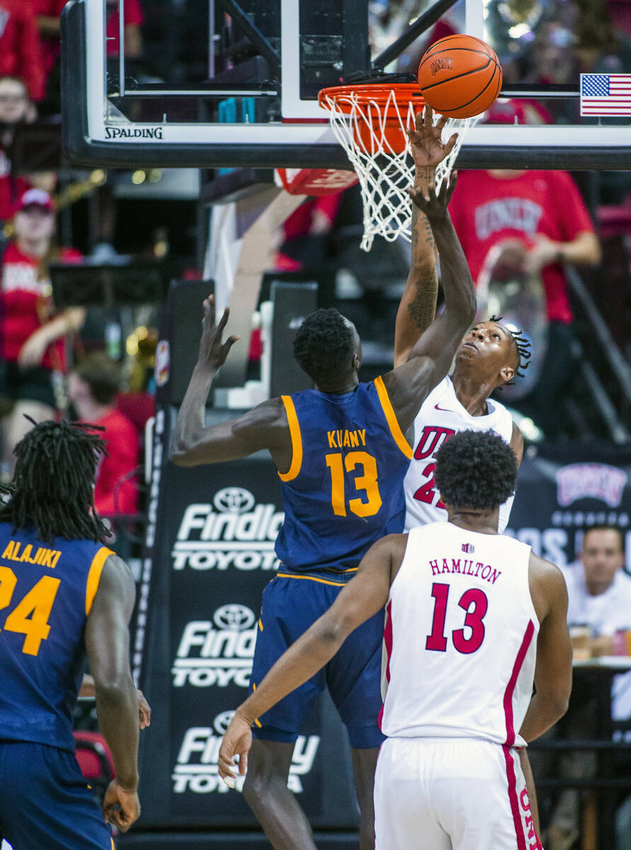 UNLV Rebels guard Josh Baker (22) rejects a shot by California Golden Bears forward Kuany Kuany ...