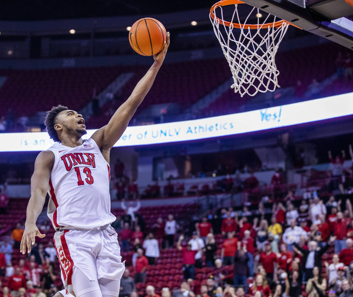 UNLV Rebels guard Bryce Hamilton (13) puts the game away after scooping up a loose ball late ve ...