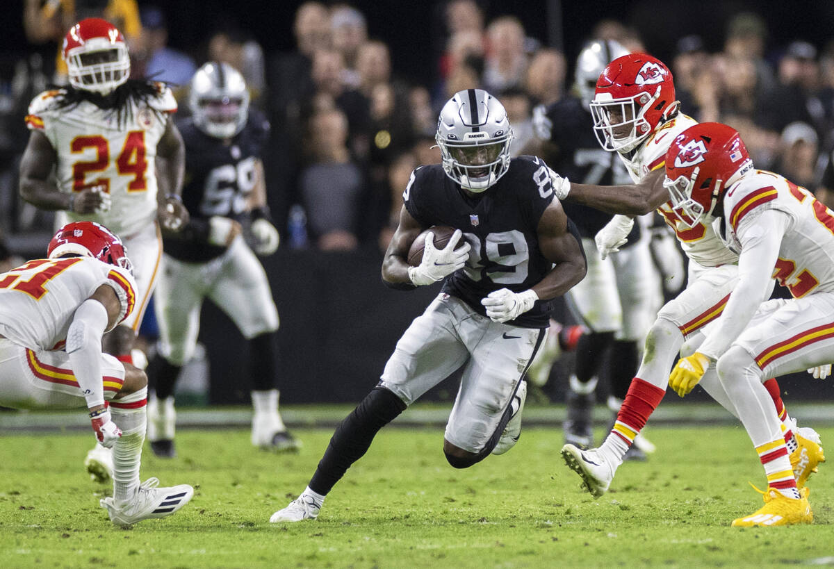 Raiders wide receiver Bryan Edwards (89) runs past Kansas City Chiefs safety Juan Thornhill (22 ...