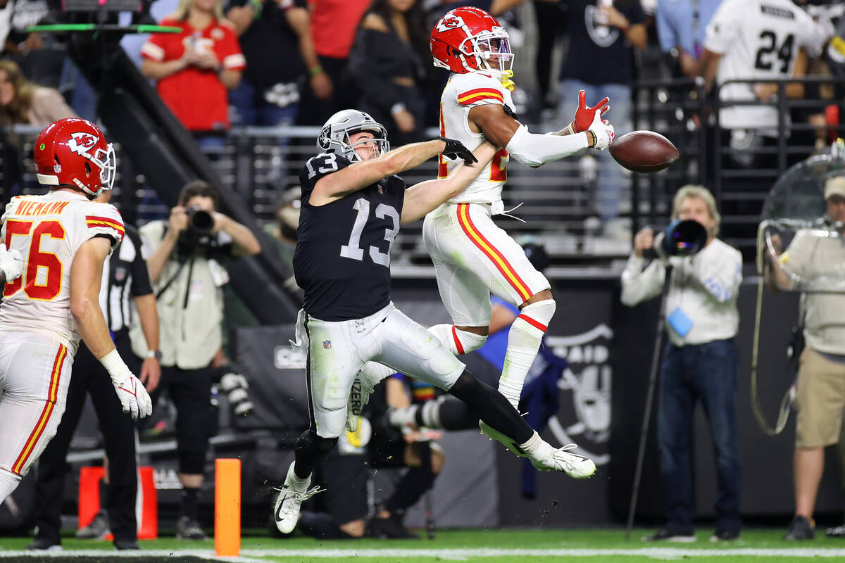 Kansas City Chiefs cornerback Mike Hughes (21) breaks a pass intended for Raiders wide receiver ...