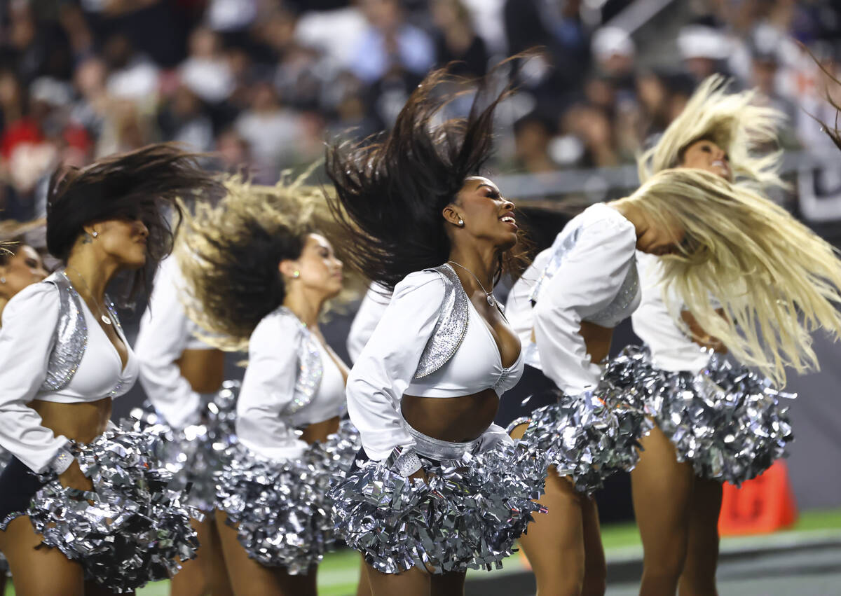The Raiderettes perform during the first half of an NFL game against the Kansas City Chiefs at ...