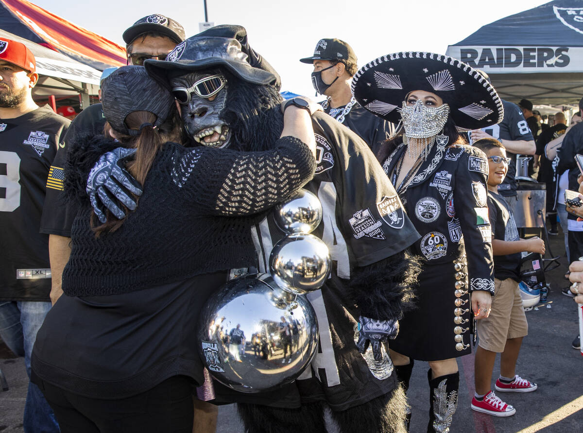 Raiders fans clasp  successful  tailgating earlier  an NFL crippled  versus the Kansas City Chiefs astatine  Allegian ...