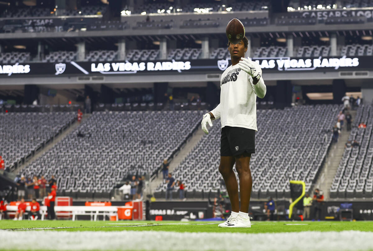 Raiders wide   receiver Zay Jones warms up   earlier  the commencement  of an NFL crippled  against the Kansas Cit ...