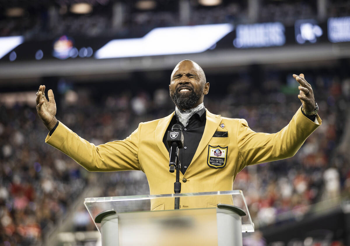 Raider Pro Football Hall of Fame inductee Charles Woodson speaks before the start of an NFL foo ...